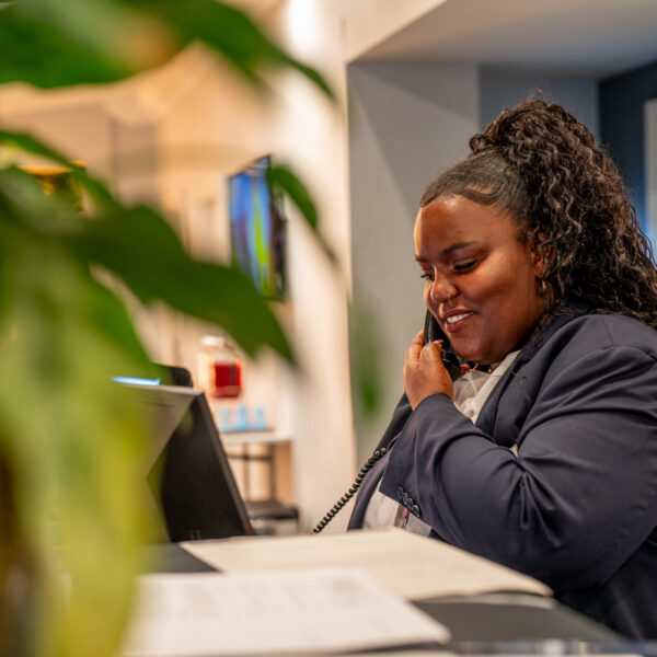 Client focused photography | Affinia and Doubletree Hilton. Outsource payroll services.