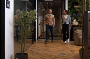 Affinia Owned Photography | Affinia, Accountants and Business Advisers. Employees walking through a office setting. Financial Services for the Recruitment Industry