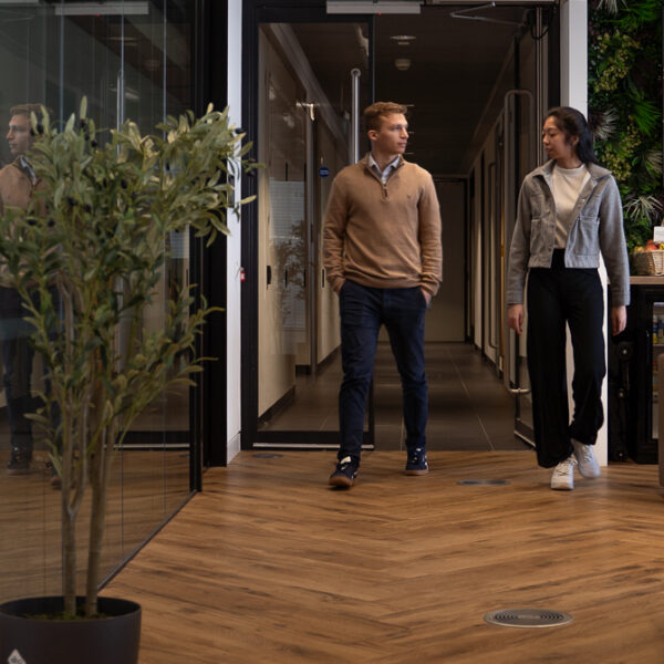 Affinia Owned Photography | Affinia, Accountants and Business Advisers. Employees walking through a office setting. Financial Services for the Recruitment Industry