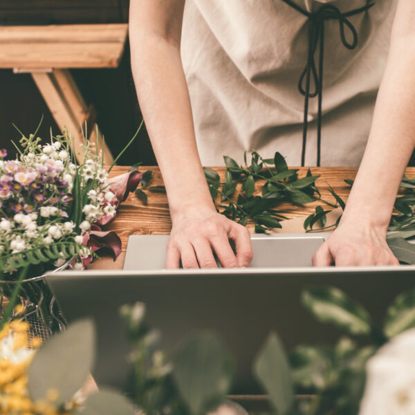 Florist working on computer