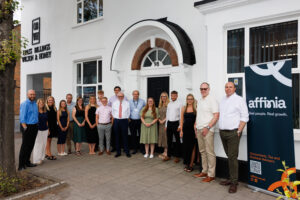 team photo in front of office