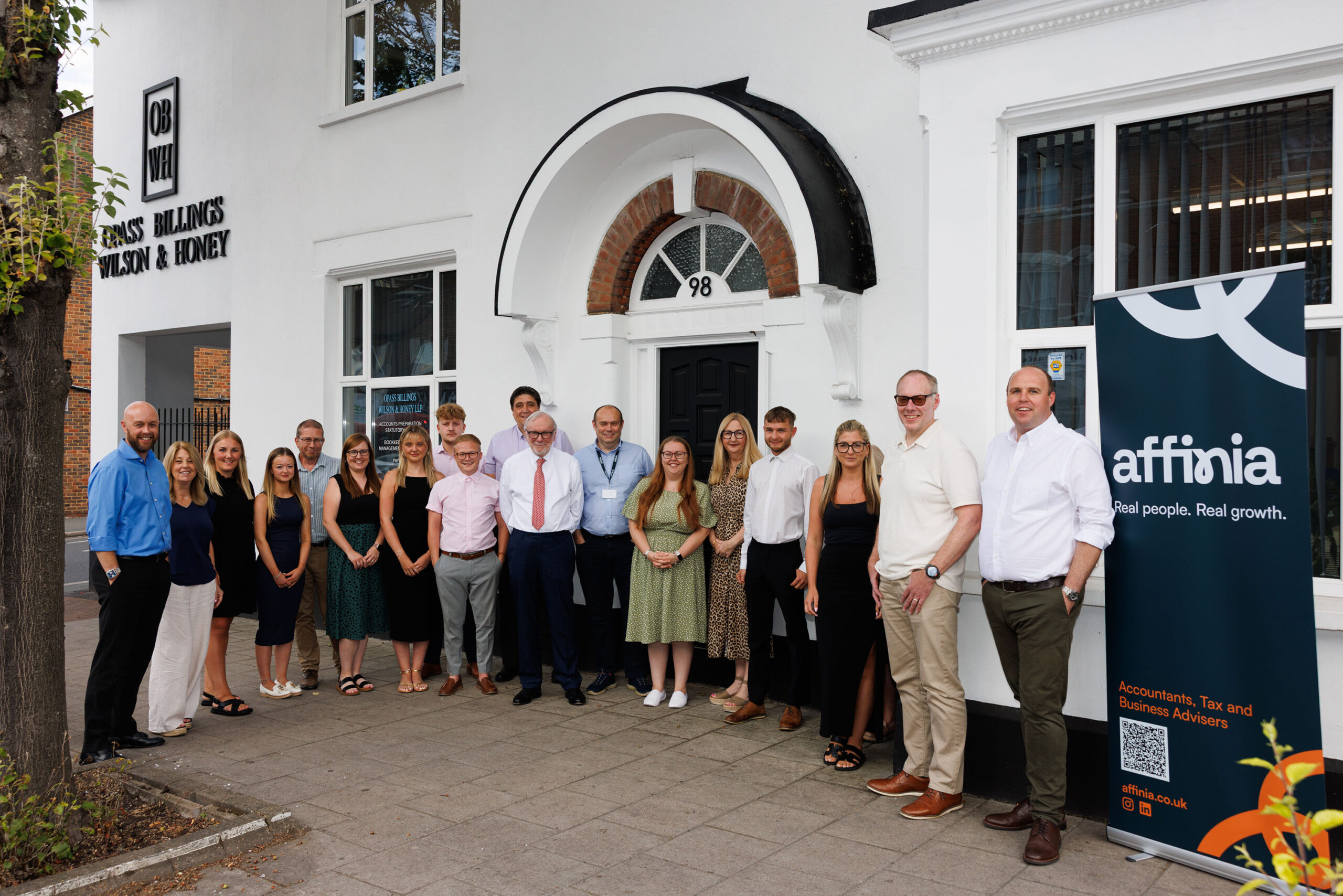 team photo in front of office