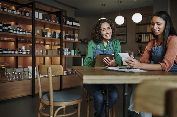 two women in shop talking