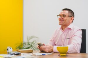 Manager With Equipment On Table