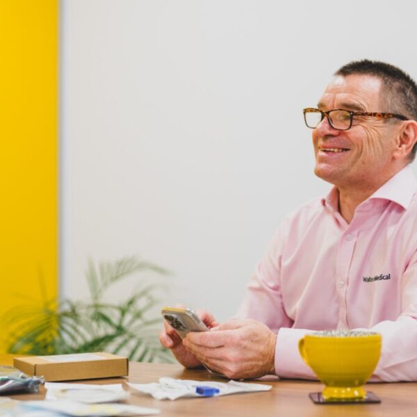 Manager With Equipment On Table